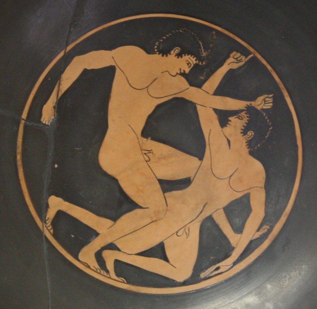 A boxing scene from an attic red-figure kylix (c. 500 BCE). Olympia Archaeological Museum. 