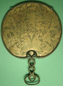 The reverse side of a Romano-Celtic bronze mirror from Desborough, Northamptonshire, England, showing the development of the spiral and trumpet decorative theme of the Early Celtic La Tène style in Britain. This items dates c. 50 BCE-50 CE.
