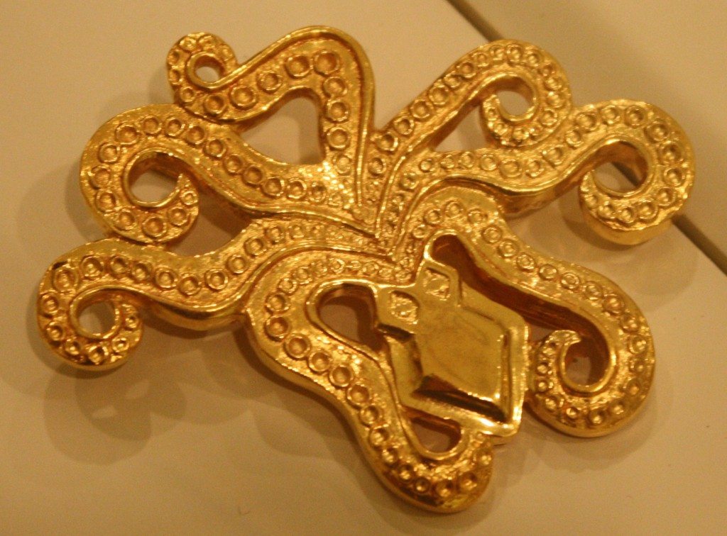 A gold Mycenaean brooch in the form of an octopus, Mycenae, mid 2nd millenium BCE. (Archaeological Museum, Mycenae)