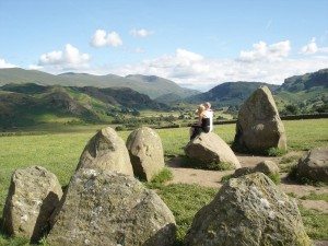 Sitting on a stone at the Castlerigg circle, in England’s Lake District, inspires contemplation. (photo: Rick Steves)