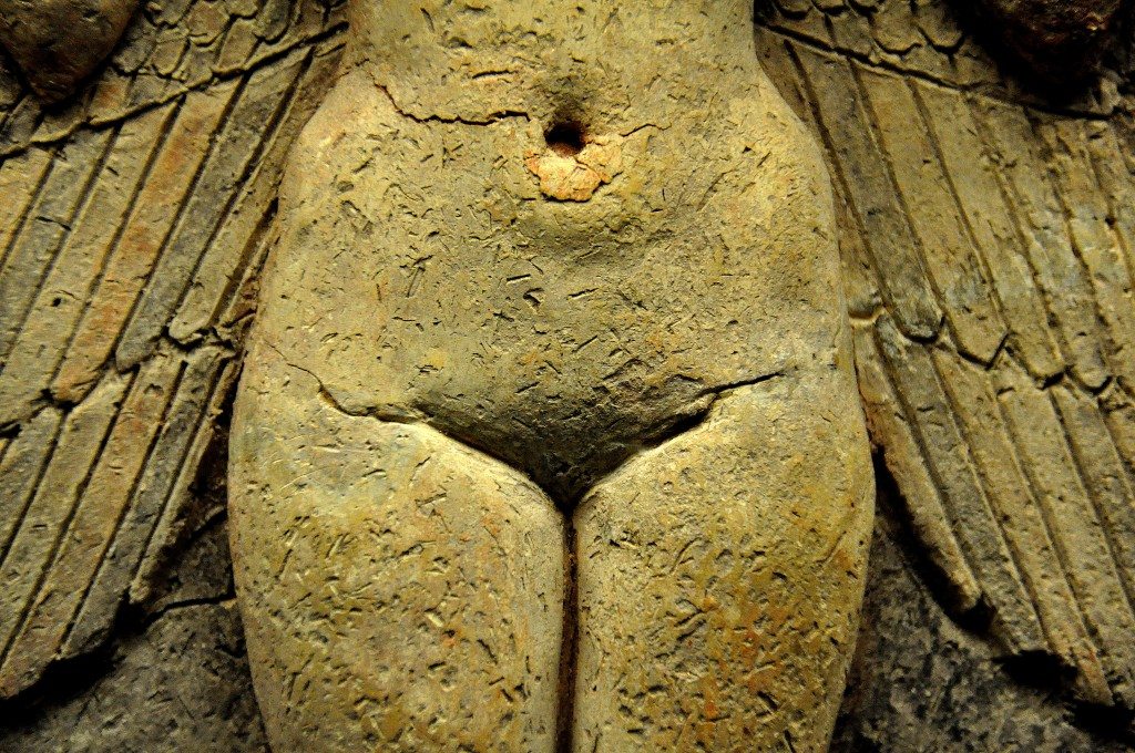 Note the perfectly depicted female-styled pelvis and the position of the navel. The pubic area curves inward and the deity's external genitalia are hidden by the upper thighs. 
