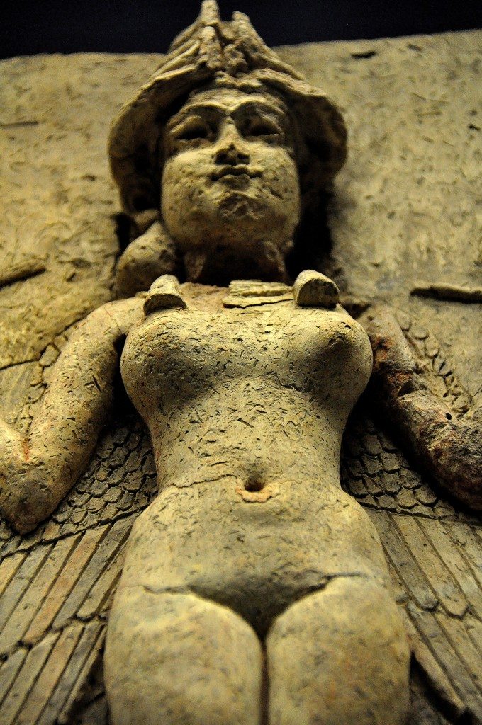 A close-up view of the female deity; shooting from blow. Note the overall very attractive femininity. She stands with power and dignity, though. 