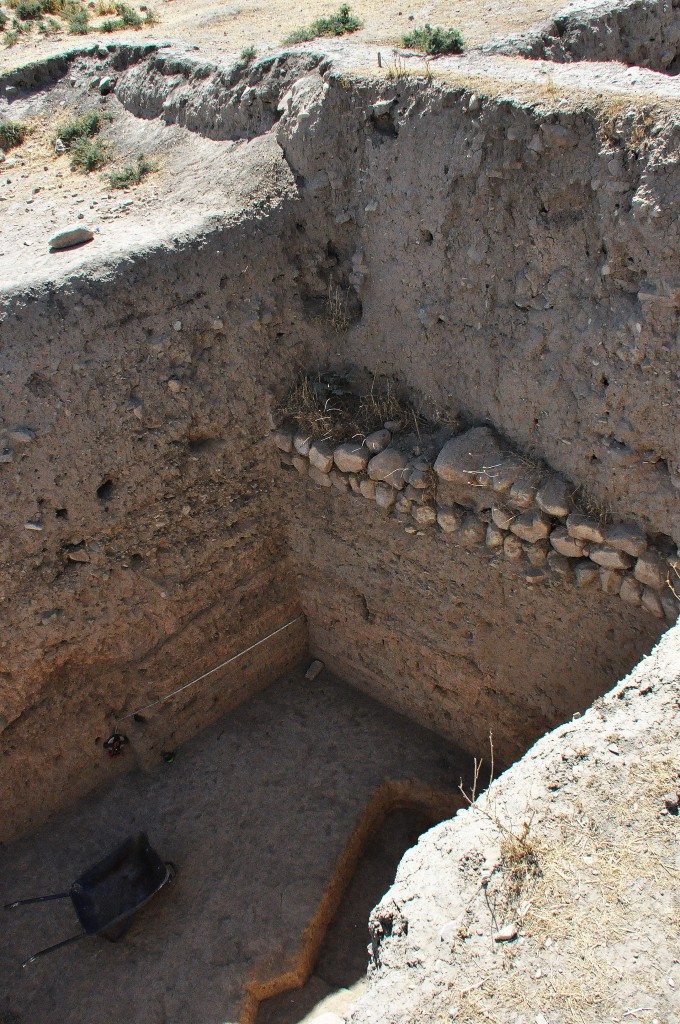 One of the excavated areas. Note how deep they have reached and the appearance of a foundation stone layer. 