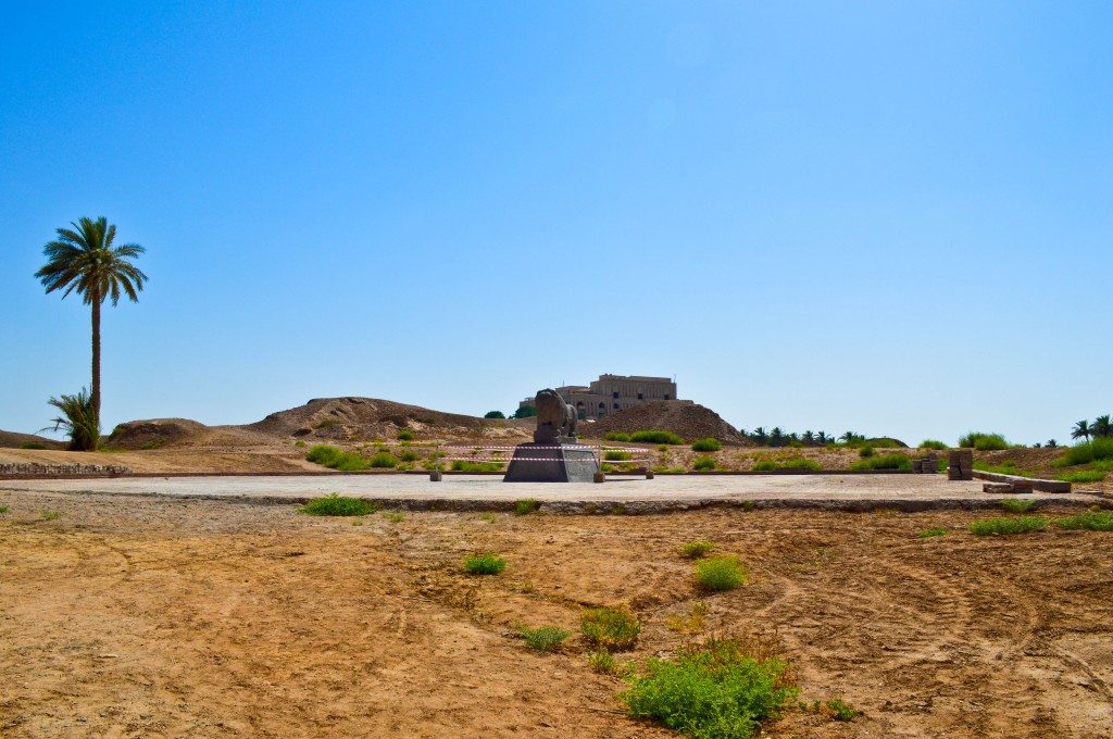 General view of the Lion of Babylon statue. The surrounding area and the pedestal underwent a renovation work recently. The statue itself underwent no changes. The work has been completed by now and the ribbon has been removed, thereafter. The palace of Saddam Hussein, which was built on an artificial mound, appears behind the statue.