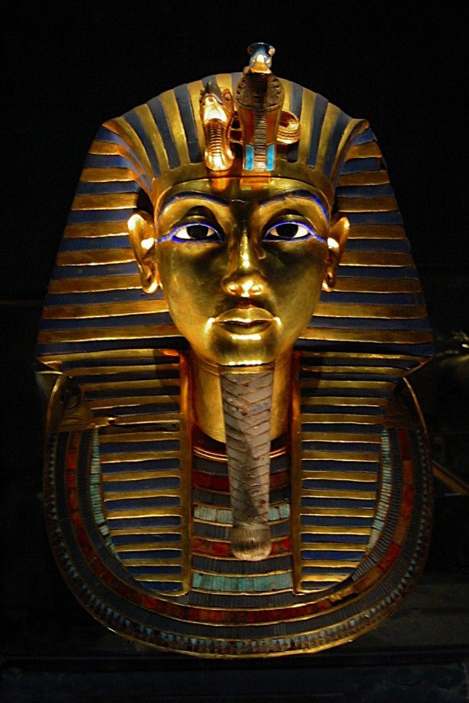 The death mask of Egyptian pharaoh Tutankhamun. The mask is made of gold, precious stones and glass inlay, 14th century BCE. (Museum of Egyptian Antiquities, Cairo) 