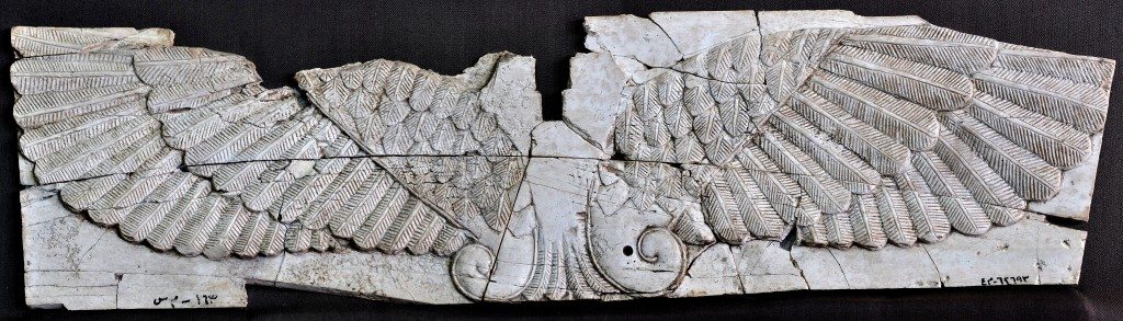 Carved ivory plaque of wings of God Ashur. Neo-Assyrian period, 9th-7th centuries BCE. From Nimrud, Mesopotamia, Iraq. (The Sulaimaniya Museum, Iraq). 