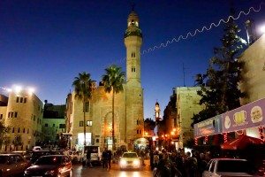 In Bethlehem, the Mosque of Omar with its towering minaret shares Manger Square with the Church of the Nativity. (photo: Rick Steves)