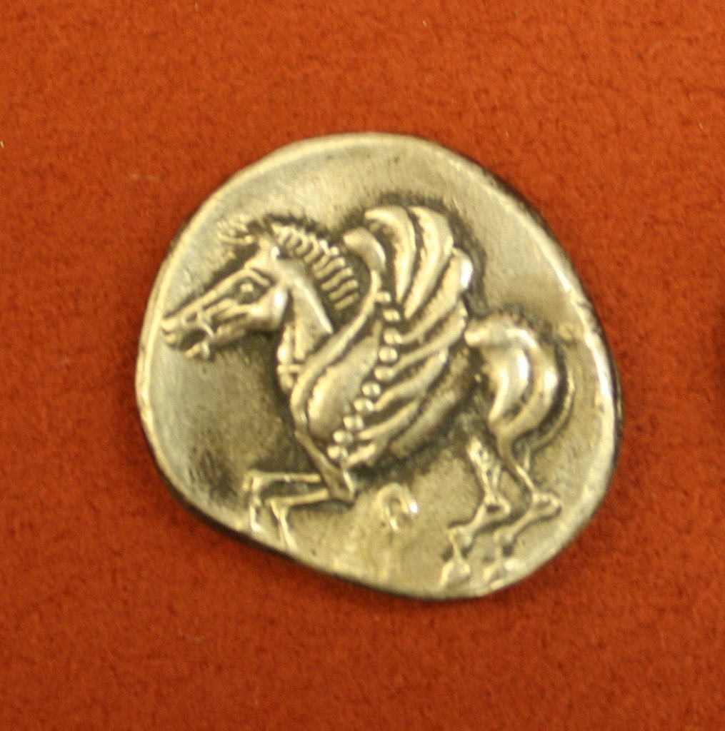 Pegasus the winged-horse who was born from the severed head of Medusa and who helped the hero Bellorophon. 6th century BCE coin from Corinth. Alpha Bank Collections, Athens. Photographer: Mark Cartwright