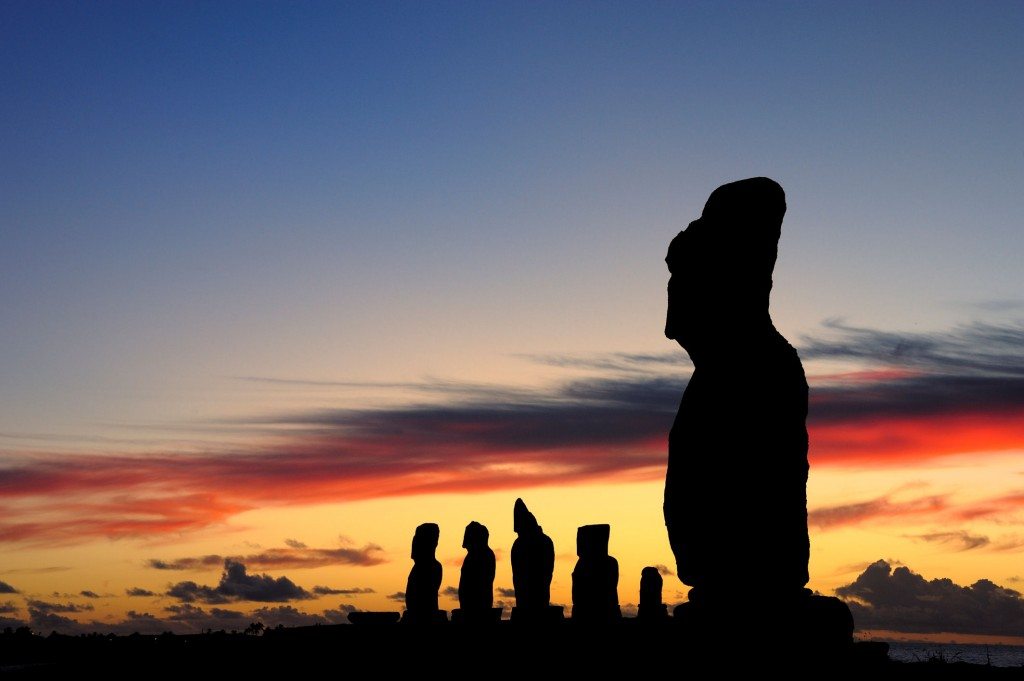Moai against a setting sun on Easter Island, Chile. Adam Stanford @Aerial-Cam for RNLOC. (Courtesy of Manchester Museum.)