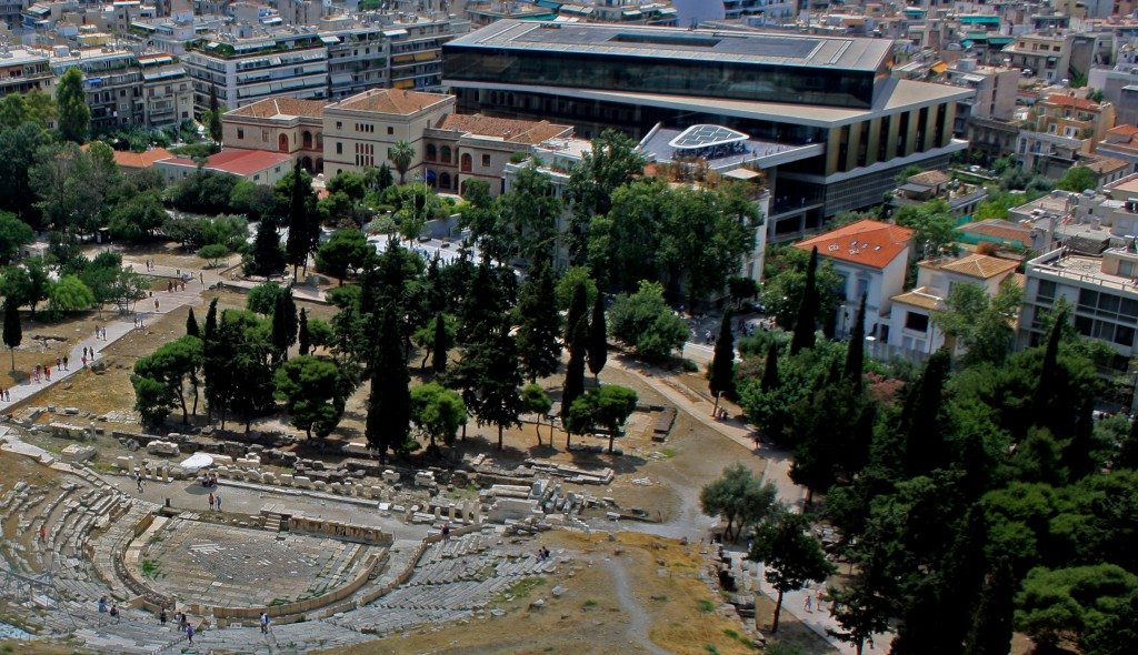 The New Acropolis Museum and the Theatre of Dionysus as viewed from the Acropolis. Author’s own. 