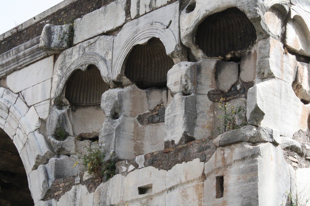 A detial of the niches of the Arch of Janus, Rome. They would have once had statues placed in them.