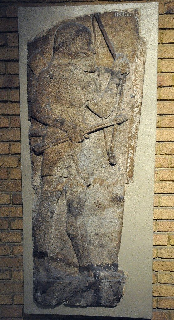 This gypsum relief, which depicts an archer, was part of a larger wall relief that demonstrates the Assyrian army and Sargon II's attack on the city of Amqaruna (Biblical Ekron) in central Palestine, probably in 720 BCE. The archer holds a bow and arrows and wears a loin-cloth with fringe; obviously he is not an Assyrian soldier (an enemy?). From the palace of Sargon II at the city of Khorsabad (ancient Dur-Sharrukin), northern Mesopotamia. Iraq. Neo-Assyrian period, 710-705 BCE. (The British Museum, London). Photo © Osama Shukir Muhammed Amin FRCP (Glasg) 