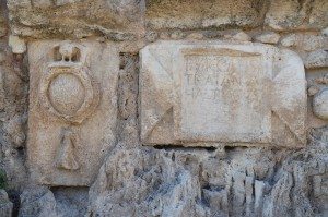 Inscription dedicated to Hadrian, from the High Level Aqueduct of Caesarea at Beit Hananya, with emblem depicting the 10th legion. 
