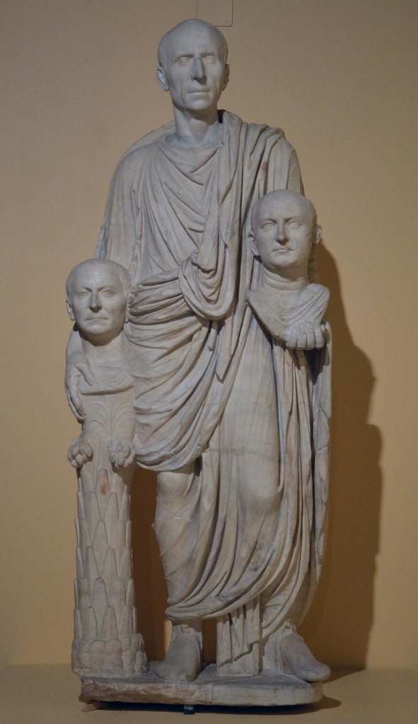 The so-called Togatus Barberini group, a funerary statue depicting a Roman senator holding the imagines (effigies) of deceased ancestors, late 1st century BC, head (not belonging) middle 1st century BC Centrale Montemartini, Rome museum. Photo © Carole Raddato.