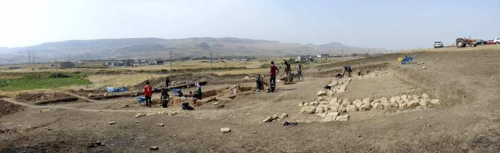 Panorama view of part of Tell Kunara, where the excavating team of the French National Center for Scientific Research is working. Sulaymaniyah City, Iraqi Kurdistan. 3rd Millennium BCE. The mountain on the background houses the ancient Paleolithic caves of Hazar Merd. 