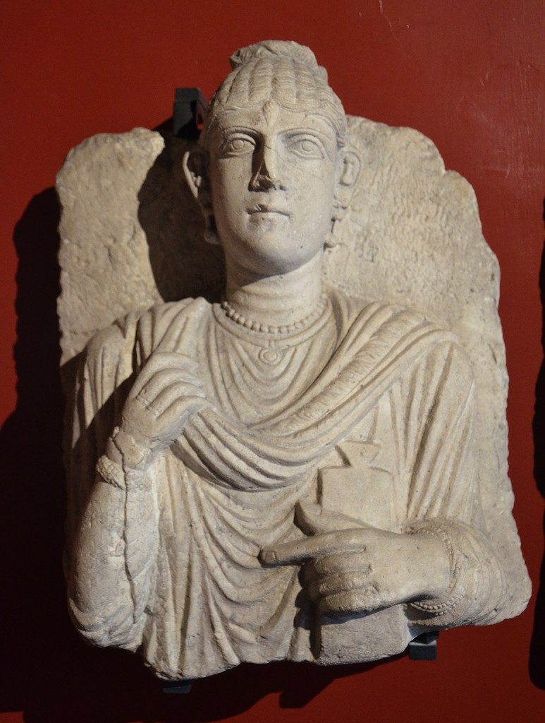 Funerary bust of a woman from Palmyra, she is holding a writing tablet on her left hand Roman Imperial period, 3rd century AD Vatican Museums, Rome