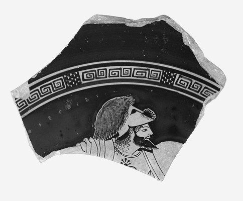 Attic Red-Figured Cup or Bowl Fragment with Warrior Wearing Scalp of Enemy on Helmet, 500–490 BCE. Attributed to Onesimos as painter (active ca. 505–480 BCE). Signed by Euphronios as potter (active 520–470 BCE). The J. Paul Getty Museum (86.AE.311). 