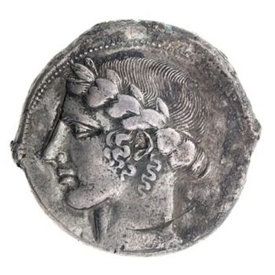 Tetradrachm with Apollo from Leontini, 435-430 BCE. The American Numismatic Society (1997.9.121). This silver coin together with coin no.19 span part of the ancient Greek-speaking world, from Leontini in Sicily to Alabanda in Asia Minor (modern western Turkey). The head of Apollo in profile on the obverse, or front, of marks the wide popularity of this perpetually youthful Olympian god. Greek adult men would ritually cut their hair and grow a beard, but Apollo, whose long hair is often described as golden, defines the ultimate appearance of an ephebe, a beardless adolescent. Apollo wears a wreath of leaves from a laurel, a tree associated with the god’s oracle and cult at Delphi. According to Greek myth, its origins lie in the story of the beautiful nymph Daphne (the Greek word for laurel), who was transformed by Zeus into a laurel tree in order to avoid Apollo’s ardent and unwanted advances. Her long tresses became the tree’s branches. The story was recounted, among others, by the ancient Roman poet Ovid in the Metamorphoses.