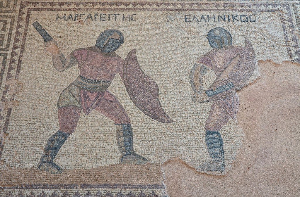 Mosaic depicting two gladiators in combat, their names in Greek listed above: Margarites (left) and Hellenikos (right), late-3rd century AD, House of the Gladiators, Kourion