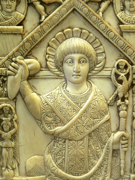 Flavius Anastasius Paulus Probus Sabinianus Pompeius (consul 517 CE) in consular garb, holding a sceptre and the mappa, a piece of cloth used to signal the start of chariot races at the Hippodrome. Ivory panel from his consular diptych.