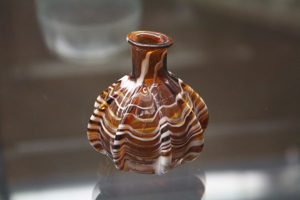 A glass perfume bottle. Roman glass at the Archaeological Museum of Pavia. Image © Mark Cartwright.