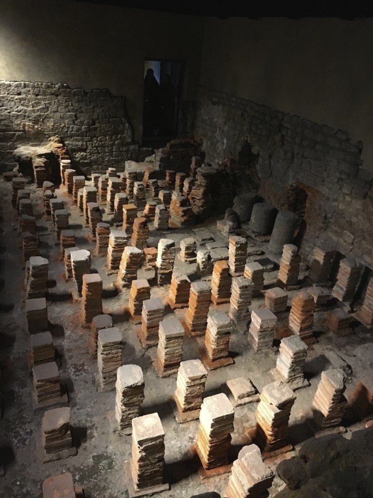 Remnants of the hypocaust at the Roman baths. Image © Caroline Cervera.
