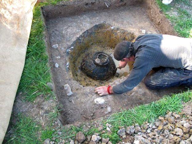 Alan Graham excavating the Frome Hoard, one of the largest hoards in Britain. Image © Somerset County Council and British Museum.