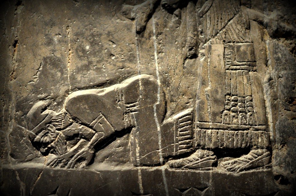 Jehu (son of Omri), king of Israel, bows and prostrates before the Assyrian king Shalmaneser III (not shown). An Assyrian attendant stands behind Jehu. Jehu is thought to be a Biblical figure. Detail of the Black Obelisk, Side A, register 2. Photo © Osama S. M. Amin. Black Obelisk of Shalmaneser III.