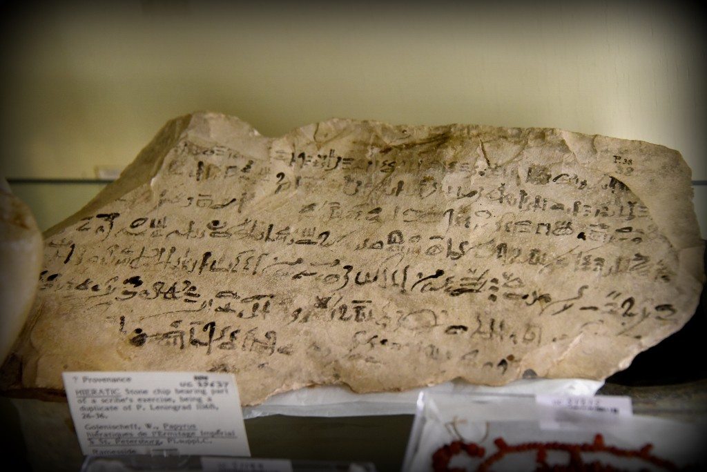 This is a limestone ostracon which bears on one side parts of 8 lines of hieratic inscriptions (in black), giving part of the "Prophecy of Neferty". At the center top, one area seems to have flaked off and then been re-attached in more recent times. At bottom right a sign has been written over the edge; the reed slipping onto the underside. From Egypt. Ramesside period, 1292–1069 BCE. With thanks to the Petrie Museum of Egyptian Archaeology, UCL. Photo © Osama S. M. Amin.