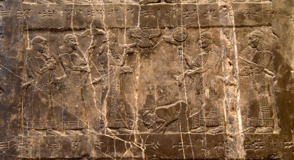 Side A: King Shalmaneser III stands beneath a parasol and accepts the tribute of Iaua of the House of Omri (in 841 BCE). This is King Jehu of Israel, who appears in the Bible (2 Kings 9-10). Photo © Osama S. M. Amin. Black Obelisk of Shalmaneser III.