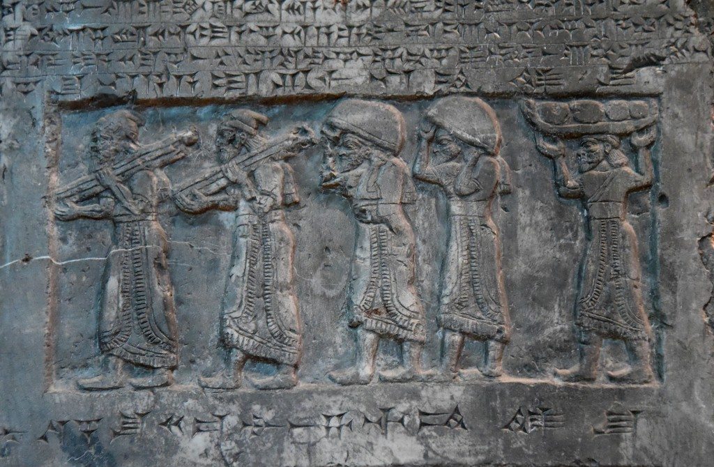 Side D: There are five tribute-bearers bringing silver, gold, tin, bronze cauldrons (and) the “staffs of the king's hand” from Gilzanu. Photo © Osama S. M. Amin. Black Obelisk of Shalmaneser III.