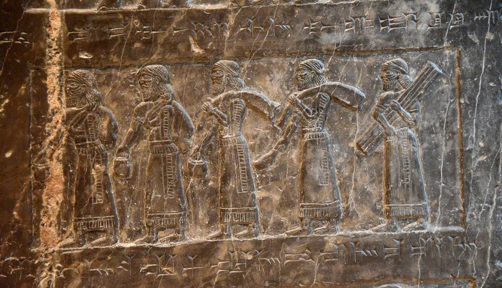 Side C: We can see 5 tribute-bearers bringing "silver, gold, gold pails, ivory [tusks] (and) spears" from the land of Suhu. Photo © Osama S. M. Amin. Black Obelisk of Shalmaneser III.