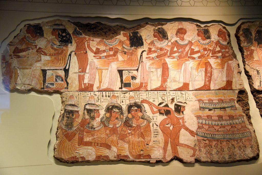 Part of the feast scene. Musicians are playing their instruments. Some naked young girls are dancing while other naked girls are serving Nebamun's guests. The British Museum, London. Photo © Osama S. M. Amin. 