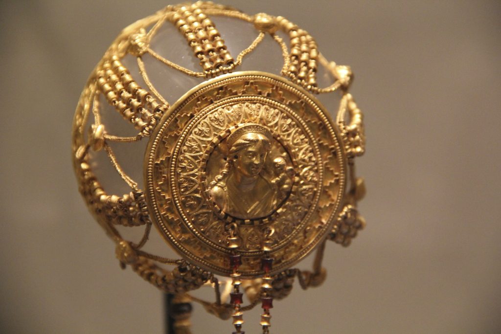 This golden ornament is comprised of a wide array of small chains, links, and designs. Image © Caroline Cervera. Hellenistic jewelry.