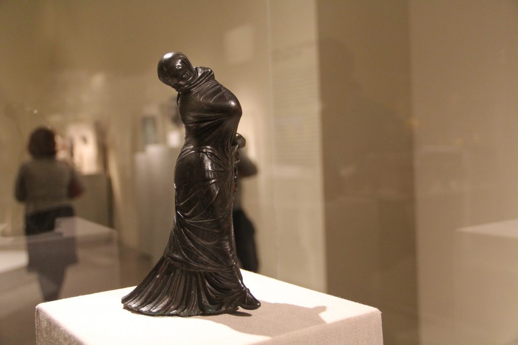 Hellenistic statuette of a veiled and masked dancer, found in Alexandria, Egypt. Image © Caroline Cervera.