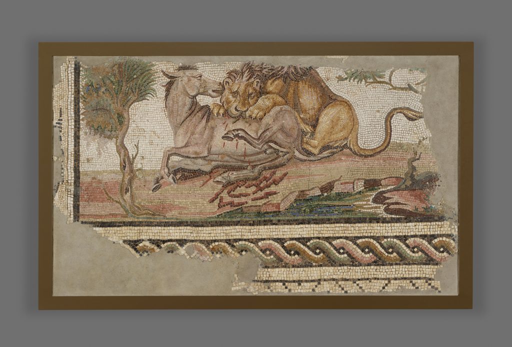 Lion Attacking an Onager. Roman, from Hadrumetum (present-day Sousse, Tunisia), A.D. 150–200. Stone and glass. 38 ¾ x 63 in. The J. Paul Getty Museum, Villa Collection, Malibu, California.