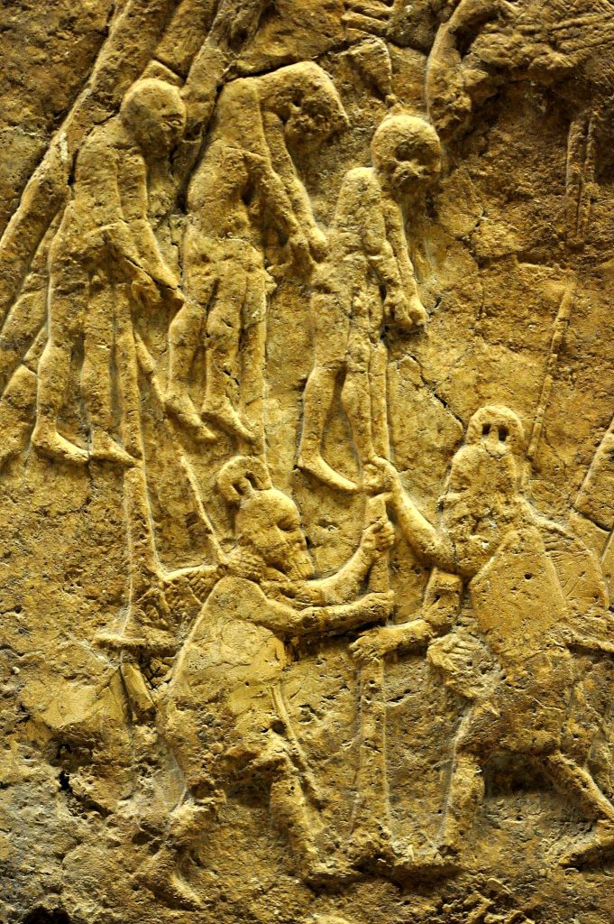 Early in the battle, some of the soldiers of Lachish were captured by the Assyrian army. This detail of the stone panel depicts an impalement process; three prisoners of war are being impaled by Assyrian soldiers. Impalement is not an ordinary method of execution; it is a very brutal and ruthless way that was used in wartime to suppress rebellions. Those prisoners of war were impaled in front of the city of Lachish to terrorize them. The death is very painful is typically slow; many hours are needed to kill the victim. From Nineveh (modern-day Mosul Governorate, Iraq), Room XXXVI of the South-West Palace, panels 7. The British Museum, London. Photo © Osama S. M. Amin.