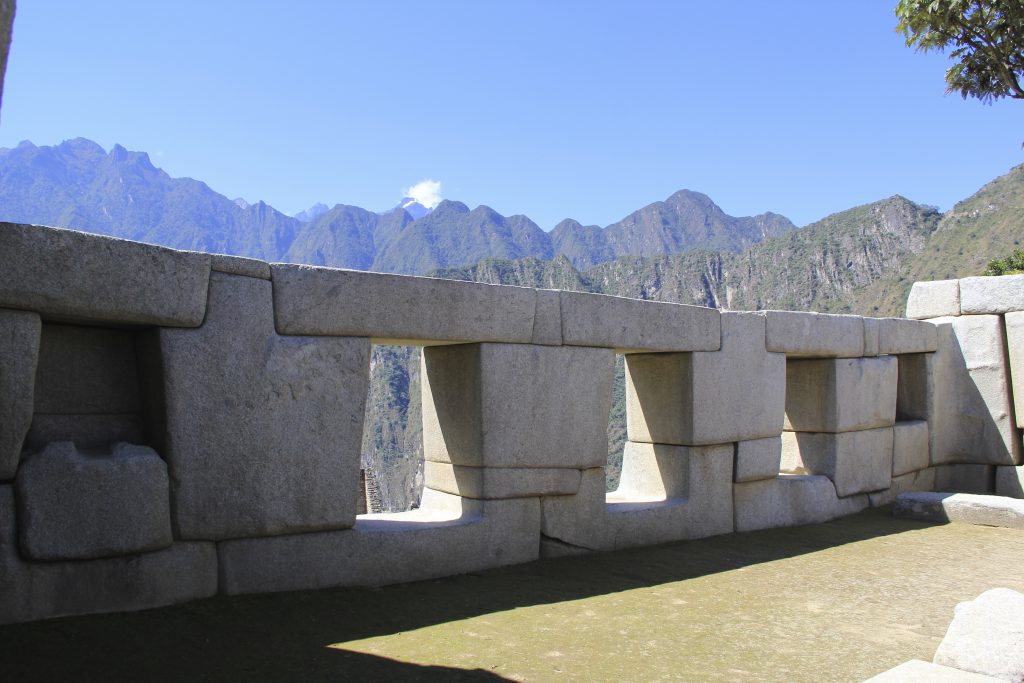 These trapezoidal windows overlook the steep mountains surrounding Machu Picchu. Photo © Caroline Cervera. Inca architecture