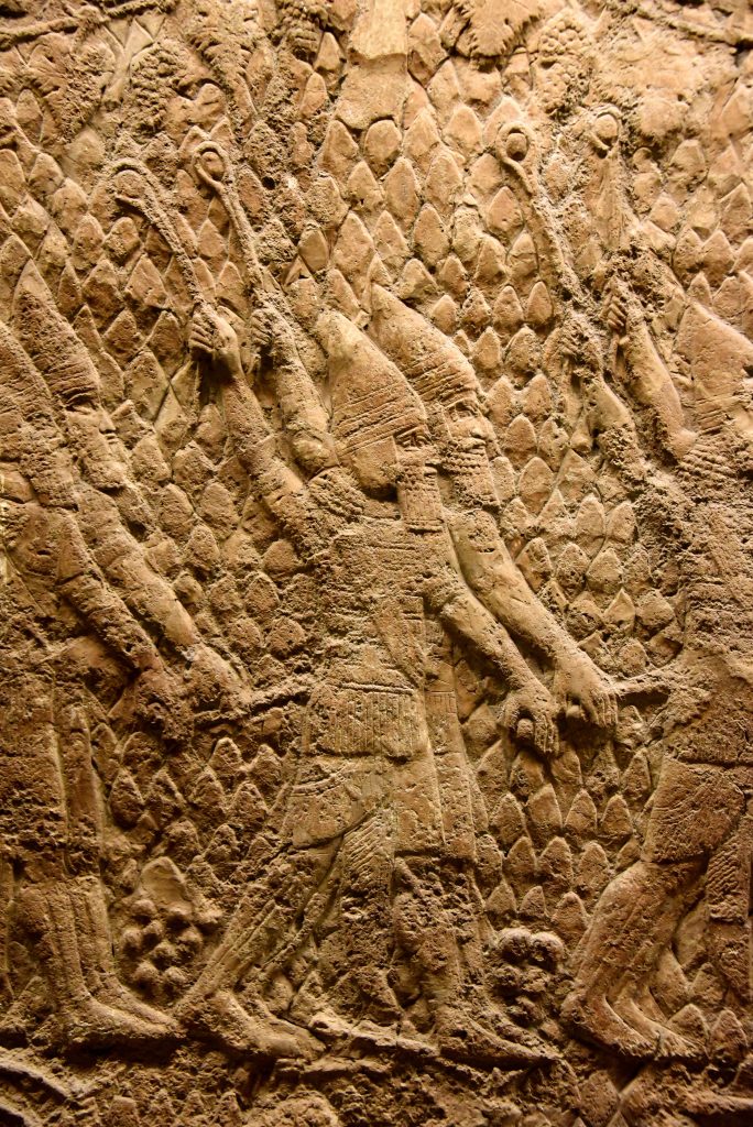 The beginning of the attack on Lachish in 701 BCE. This is a detail of a large stone wall panel which shows that Assyrian solders (part of a large-range artillery, not shown here) are slinging small rounded stones (so-called slingers), aiming at the enemy soldiers, defending the city walls towers. From Nineveh (modern-day Mosul Governorate, Iraq), Room XXXVI of the South-West Palace, panels 5-6. The British Museum, London. Photo © Osama S. M. Amin. 