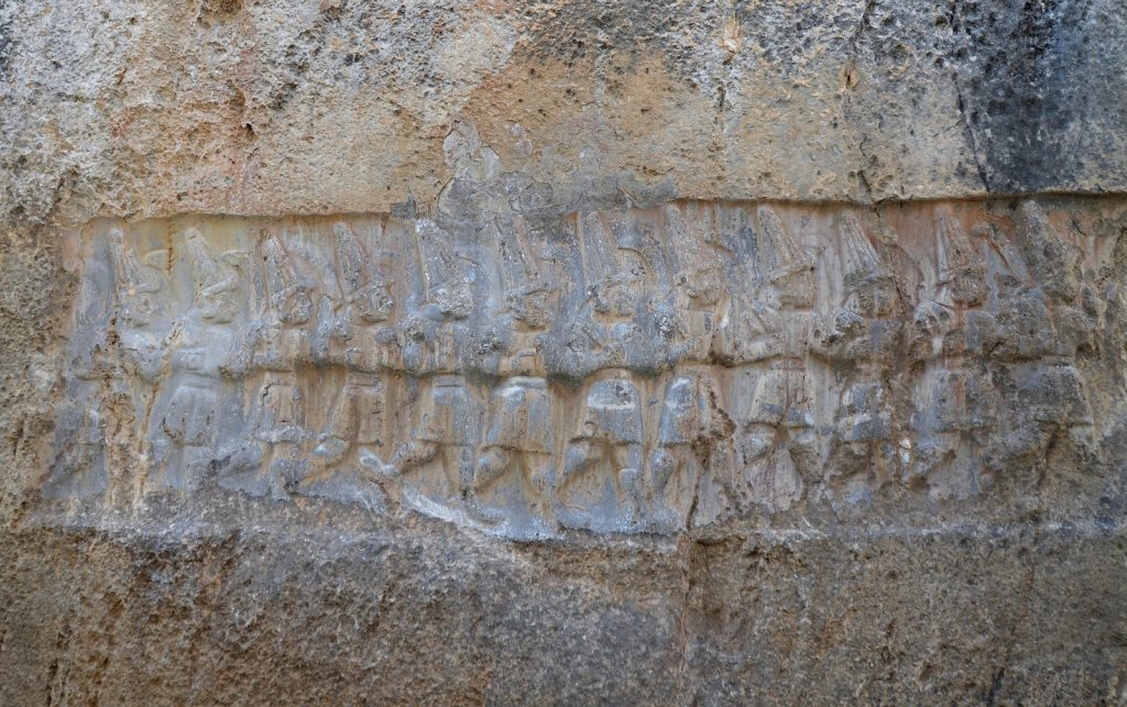 West wall of Chamber B depicting the twelve Hittite gods of the Underworld.